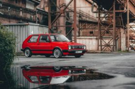 Red VW Golf GTD parked outside