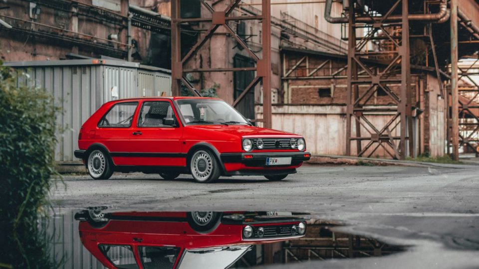Red VW Golf GTD parked outside