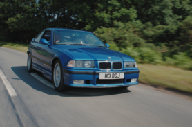 BMW driving on the road