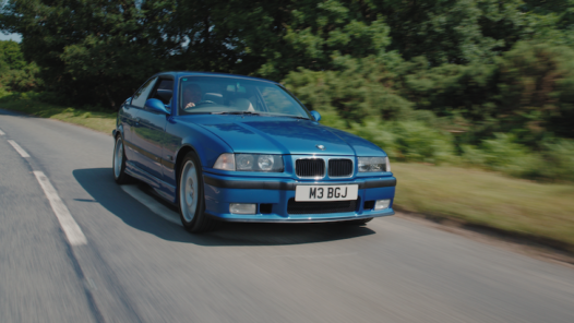 BMW driving on the road