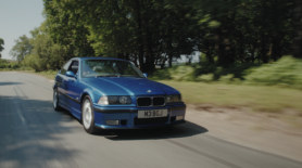 BMW driving on a road