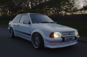 Cars that made the ‘80s – The Ford Escort driving along a road