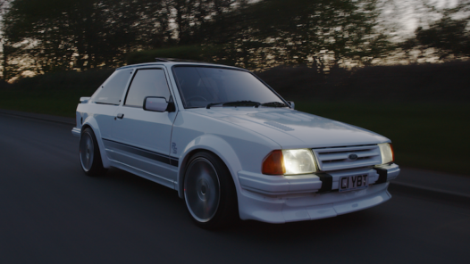 Cars that made the ‘80s – The Ford Escort driving along a road